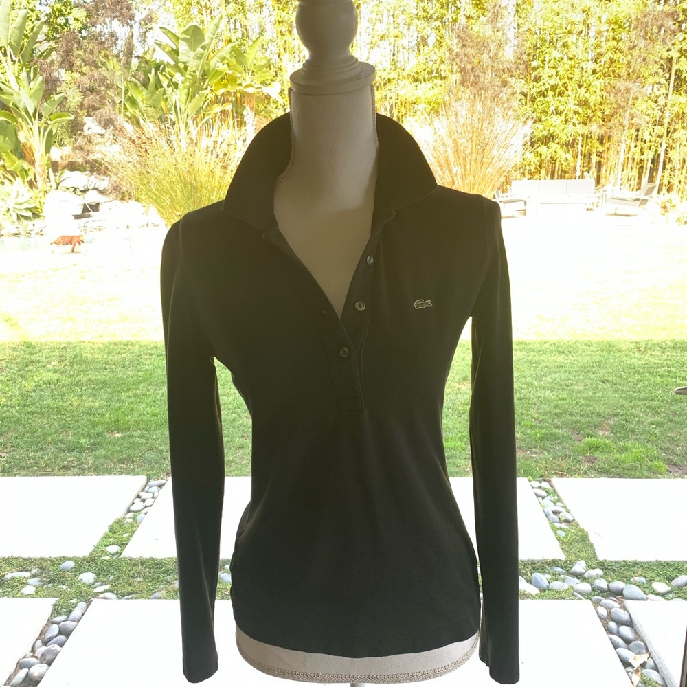 This a soft black polo shirt from Lacoste